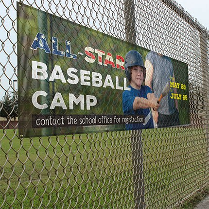 All-Star Baseball Camp promotional banner on a fence